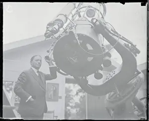 Gustavus Cook Standing with Reflecting Telescope