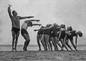 Images Dated 22nd January 2011: Gymnastics On The Beach