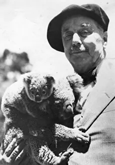 Prints of H G Wells (Herbert George Wells, 1866 - 1946), English novelist and short story writer with a koala bear and her baby. (Photo by Fox Photos/Getty Images) H G Wells (1866-1946) Prints: H G Wells