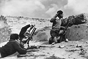 Haganah Soldiers with Weaponry Taking Cover from Mortar