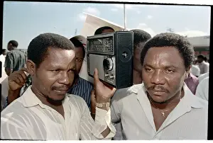 Haitians Listening to Radio