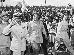 Syria Prints: Hakim Abdel Amer Waves to Crowd at Parade