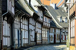 Images Dated 14th August 2014: Half timbered houses and cobbled street in the historic old town of Goslar, Germany