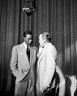 Prints of NEW YORK - OCTOBER 31: Entertainer and pianist Nat King Cole performs on The Ed Sullivan Show on Halloween, October 31, 1954 in New York City, New York A Musical Icon: Halloween Episode Of The Ed Sullivan Show