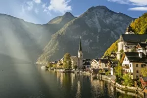 Images Dated 10th October 2014: Hallstatt at Morning with Sunlight and Reflection on the Lake, Austria