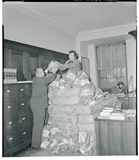 Hamer Budge Stacking Bags of Potatoes