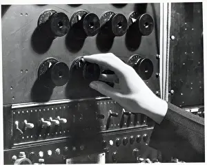Turning Prints: Hand On Dial Of Radio/Adjusting Knob
