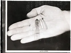 Miniature Prints: Hand Holding Communication Equipment