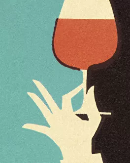 Blue Background Gallery: Hand Holding Glass of Wine