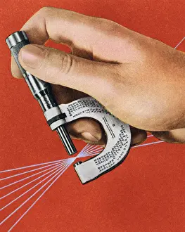 Human Thumb Prints: Hand Holding a Micrometer