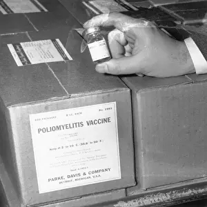 Poliomyelitis Prints: Hand Holding Vial of Anti-Polio Vaccine