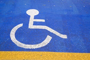 Handicapped parking, pictogram painted on an asphalt parking lot, Montreal, Quebec Province, Canada