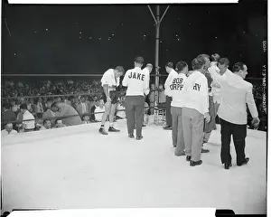 Handlers Surrounding the Fighters