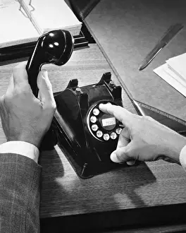 Using Phone Prints: Hands dialing phone