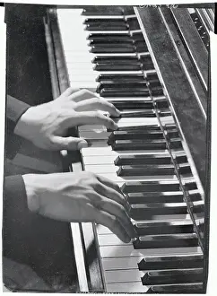 Precision Prints: Hands Playing Keys of Piano