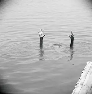 Risk Prints: Hands sticking up out of water
