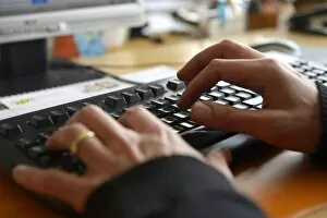 Picture Detail Gallery: Hands typing on a computer keyboard