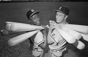 Hank Aaron Prints: Hank Aaron and Eddie Mathews Carrying Bats on Their shoulders
