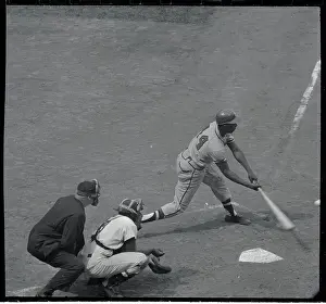 Hank Aaron Prints: Hank Aaron Hitting Baseball