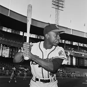 Hank Aaron Prints: Hank Aaron Holding Baseball Bat