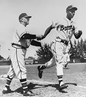 Hank Aaron Prints: Hank Aaron Rounding Third Base on the Way to Home