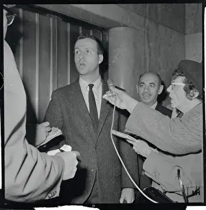 Scandal Prints: Hank Bloomgarden Talking to Reporters