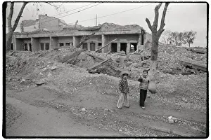 Hanoi Prints: Hanoi Residents Check US Bomb Damage 1973