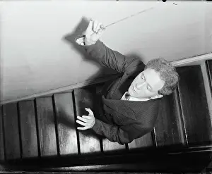 Hans Kindler Posing on Stairs with Baton