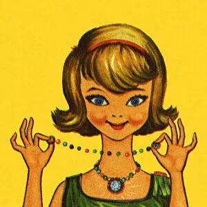 Girl Collection: Happy Girl Holding a Necklace