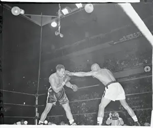 Harold Johnson Punching Archie Moore