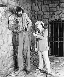 Harold Lloyd Chastizes Bearded Giant