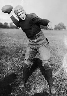 Harold Red Grange Throwing a Football