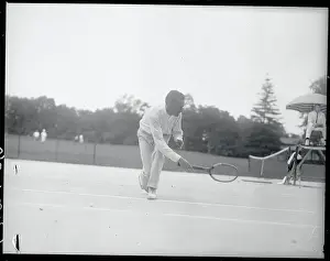 Harold Throckmorton Swinging His Racquet