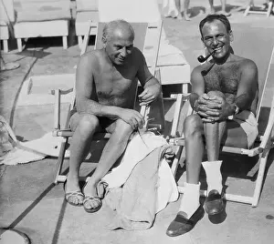 Harpo Marx and Moss Hart Relax on Beach