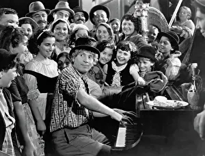 Harpo Marx Playing Piano