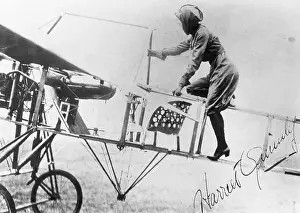 Autograph Prints: Harriet Quimby Climbing into Monoplane