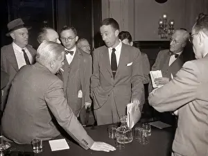 Harry Cain Talking to Reporters