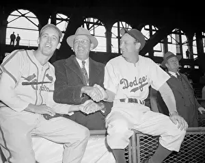 Harry and Dixie Walker Shaking Hands with Their Father