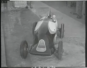 Harry Hartz Seated in Racing Car