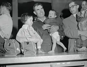 Harry Holt Holding an Infant