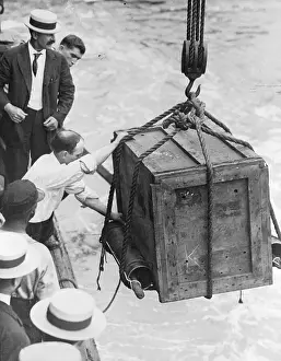 Stunt Prints: Harry Houdini in Crate Being Lowered into Water