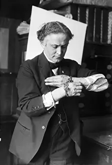Harry Houdini Escaping from Handcuffs