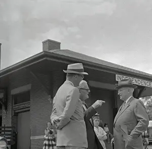 Harry S. Truman Talking with Friends at Station