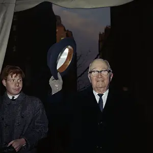 Harry Truman Holding up Hat