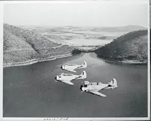Rhodesia Prints: Three Harvards Flying Over Reservoir