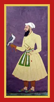 Falcon Prints: Ḥasan Khan stands against purple background