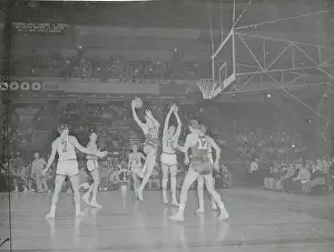 Hawks and Warriors in Fast Basketball Action
