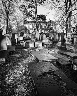 The Brontë Sisters (1818-1855) Collection: Haworth Graveyard looking to the Parsonage