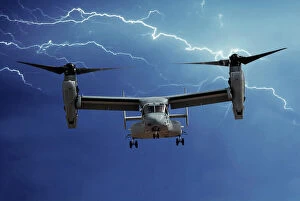 Airplanes Collection: A head-on view of a U. S. Marine Corps Bell/Boeing MV-22 Osprey tilt-rotor aircraft with lightning