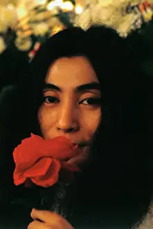 Head Shot of Yoko Ono with Rose